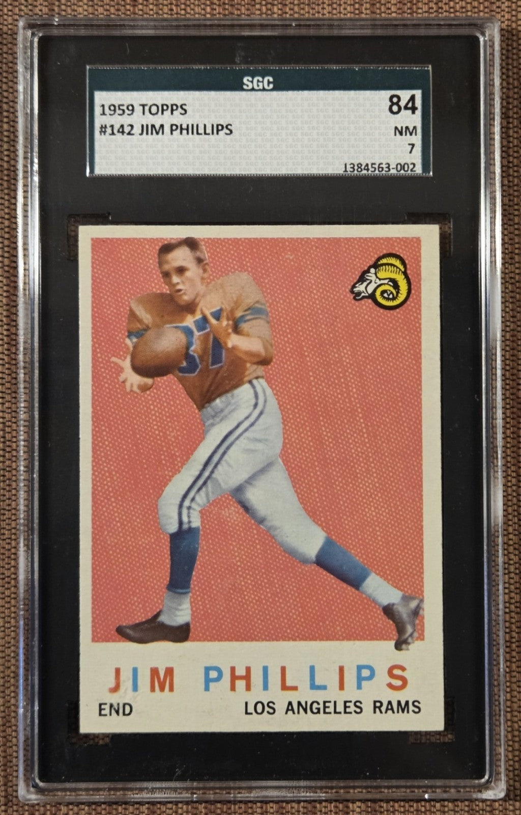 1959 Topps #142 Jim Phillips Los Angeles Rams Rookie Football Card SGC 7 NM RC0