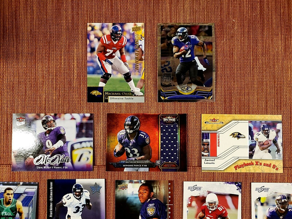RAVENS FOOTBALL CARDS PIERCE JSY /99 LANDRY RC /599 REED OHER RC RICE RC LEWIS0
